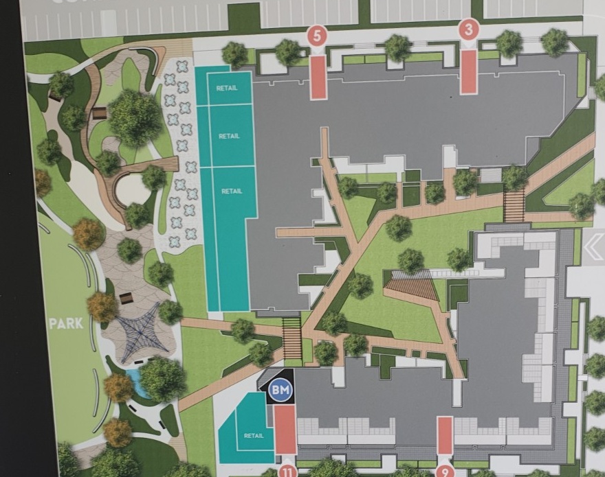 An apartment complex site map showing multiple buildings, entrances and internal routes.